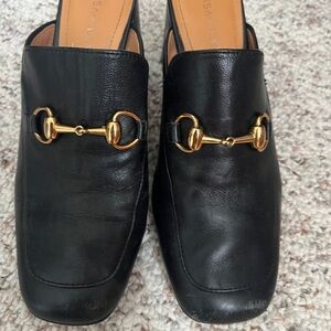 Black Leather Loafers with Gold Detailing